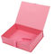 El libro forma la caja de regalo magnética impresa rosa de la cartulina con la decoración de la cinta